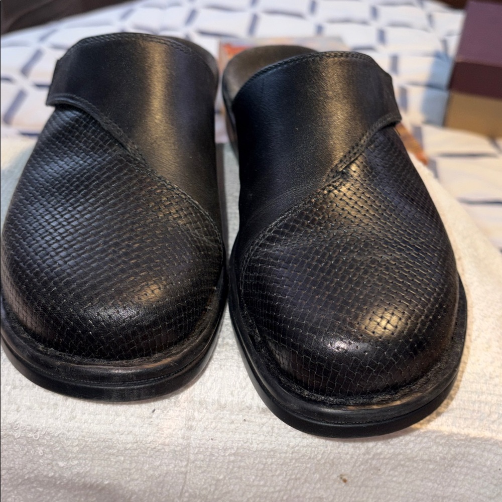 Clark’s. Black Leather Slip-On Shoes